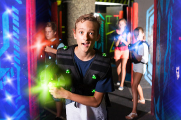 Fototapeta na wymiar Boy during lasertag game