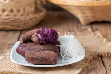 Steamed purple sweet potato in white plate