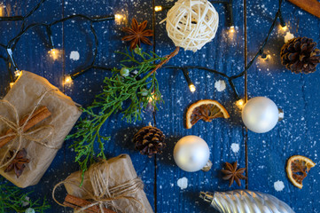 Fototapeta na wymiar Christmas gifts, garland, toys. New Year background