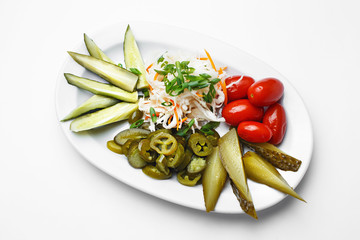 assorted salted vegetables on white background