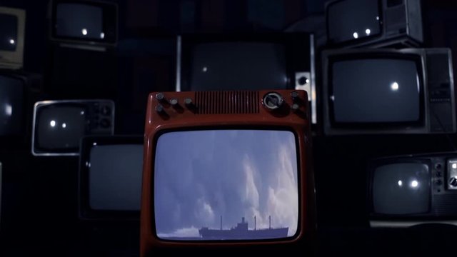 Nuclear Testing and Atomic Bomb Explosion in the Sea, as Seen on a Retro TV that Explodes and Breaks. Blue Dark Tone. Zoom In. Public Domain Footage. 