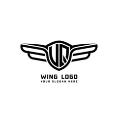 Obraz premium UQ initial logo wings, abstract letters in the middle of black