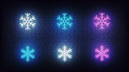 Snow icons neon. Vector glowing neon colorful snowflake icons © Stock Vector One