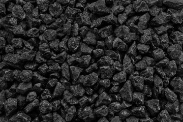 Natural black coals for background. Industrial coals. Volcanic rock energy on earth.