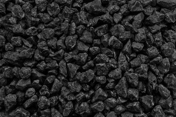 Natural black coals for background. Industrial coals. Volcanic rock energy on earth.