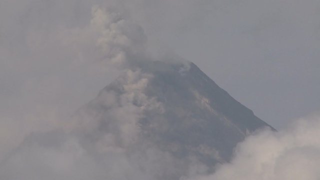 Ash Rises From Crater Of Mayon Volcano