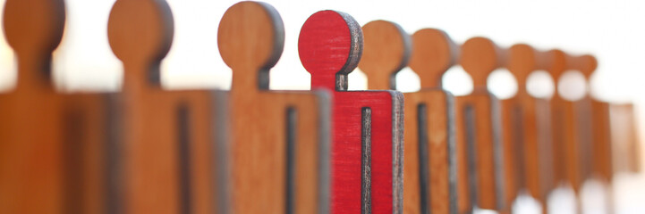 Male red plastic toy businessman silhouette wooden figure background closeup. Manipulate work recruitment transfer labour inspectorate experience exchange man hr worker subordination human concept