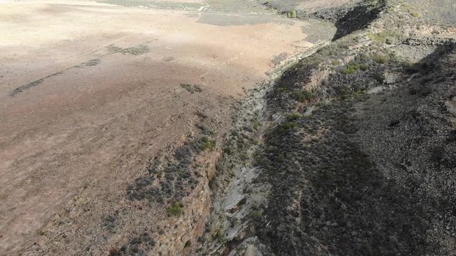 aerial view of a dry river bed in a valley in south africa