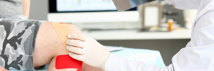 Doctor with patient holding xray shot prescribing treatment closeup