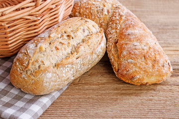 Buns and breads on breakfast table.