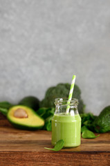 Green detox smoothies with spinach and avocado