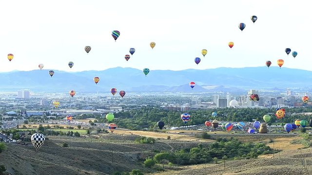 Wide Angle Pan of the Great Reno Balloon Races with City Skyline.