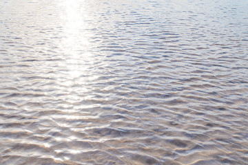 Sun glare on the bottom of lake