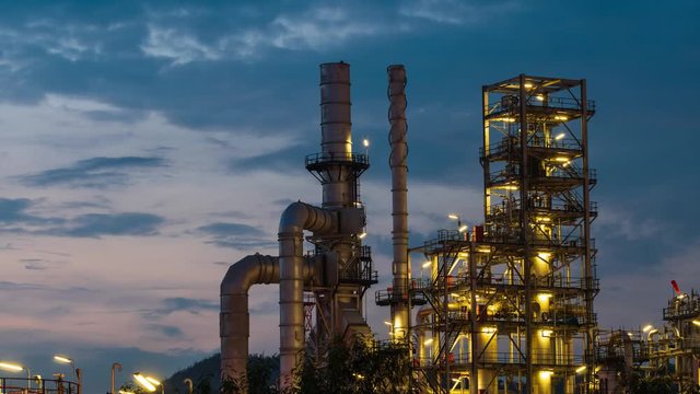 Timelapse oil terminal is industrial facility for storage of oil and petrochemical. oil manufacturing products ready for transport and business transportation. power electric plant. footage video 4k.