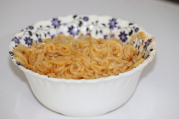 instant noodles in the bowl on wooden background - Image