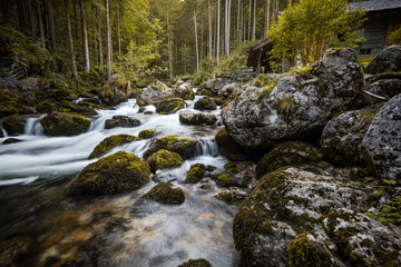 Creek Flowing by Ancient Wooden Mill near Gollinger Waterfall