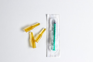 Medical ampoules, syringe.