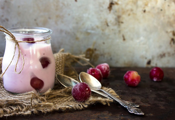 Obraz na płótnie Canvas cherry yogurt or yoghurt in glasses