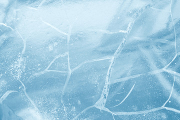 Ice background. Pattern of transparent shiny ice. Natural bright background