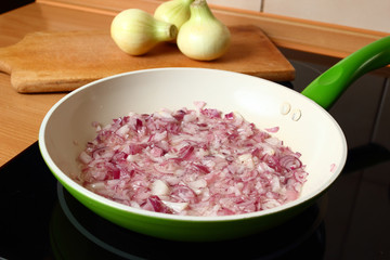 Cooking onion. Frying.