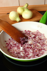 Cooking onion. Frying.