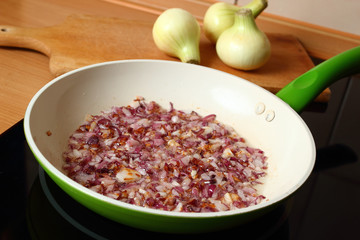 Cooking onion. Frying.