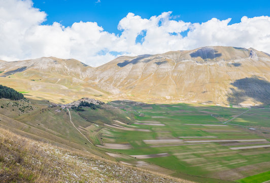 Castelluccio di Norcia, 2019 (Umbria, Italy) - The famous landscape highland of Sibillini Mountains, during the autumn, with the small stone village destroyed by a recent earthquake