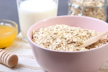 Raw oatmeal long cooking on the table.