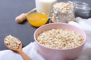 Raw oatmeal long cooking on the table.