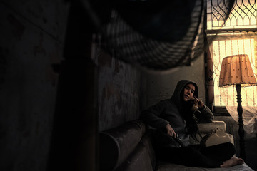 The young woman holds the money and the gun. crime, stray, dark side, drugs, selected focus, vintage style