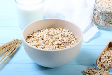Raw oatmeal long cooking on the table.