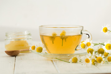 Herbal chamomile tea isolated on white background