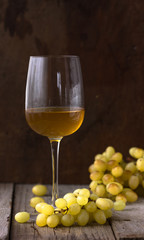 glass of white wine, grapes