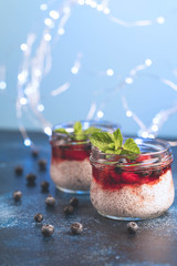 chia seed pudding, Christmas food concept, blue background, bike