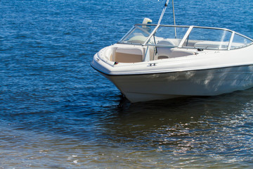 part of the motorboat in the marina, summer day
