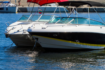 part of the motorboat in the marina, summer day