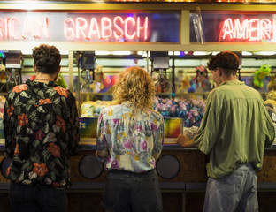 Back view playful group of friends