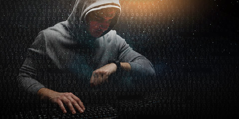 Hacker in hoodie dark theme