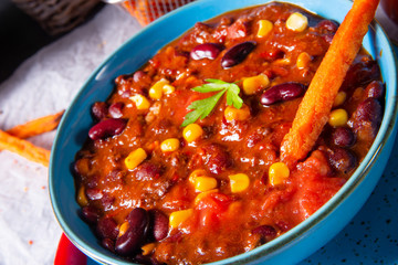 chili con carne with sweet potato and spicy nachos