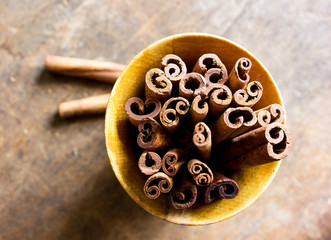 Spices and herbs. Christmas holiday composition : Beautiful close-up of dry Oranges, Cinnamon sticks and star Anis. Cinnamon sticks, anise stars,  brown  sugar  on textured background