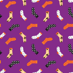 Vector seamless pattern background with socks set, collection with halloween ornaments.