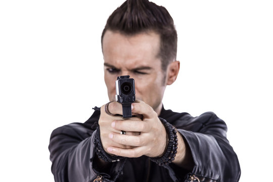 Close-up of man with handgun.