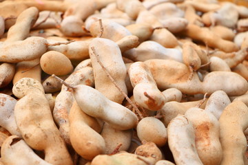 Texture details of group ripe sour brown tamarind pile