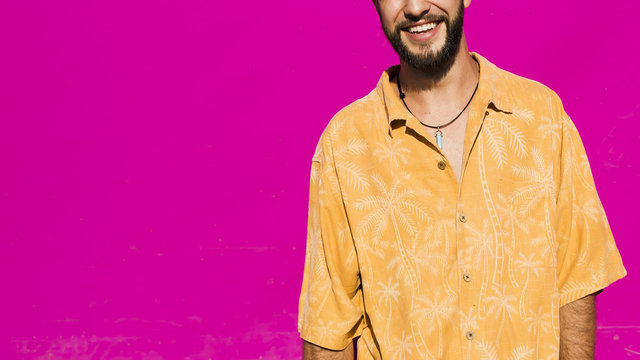 Smiley handome man with pink background