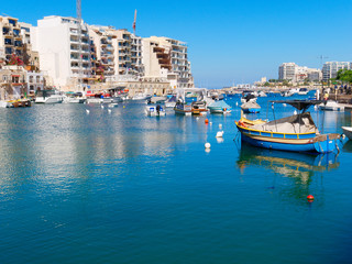 Charming boats in Spinola Bay. Malta.