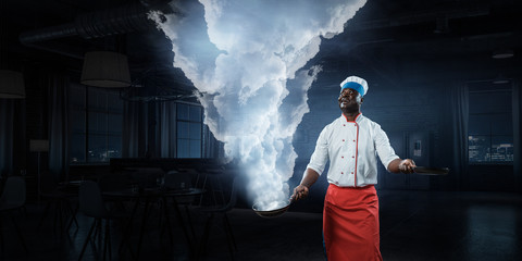 Obraz premium Cook preparing something special. Mixed media