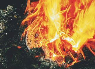 Burning fire in the blacksmith coal forge. Red hot forging  metal