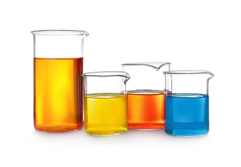 Laboratory glassware with color liquids on white background
