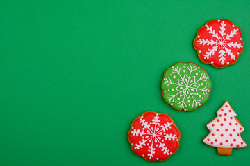 Christmas homemade gingerbread cookies on a bright colored background. New Year discount sale