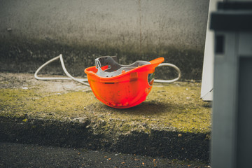 forgotten work helmet of a worker on a construction site